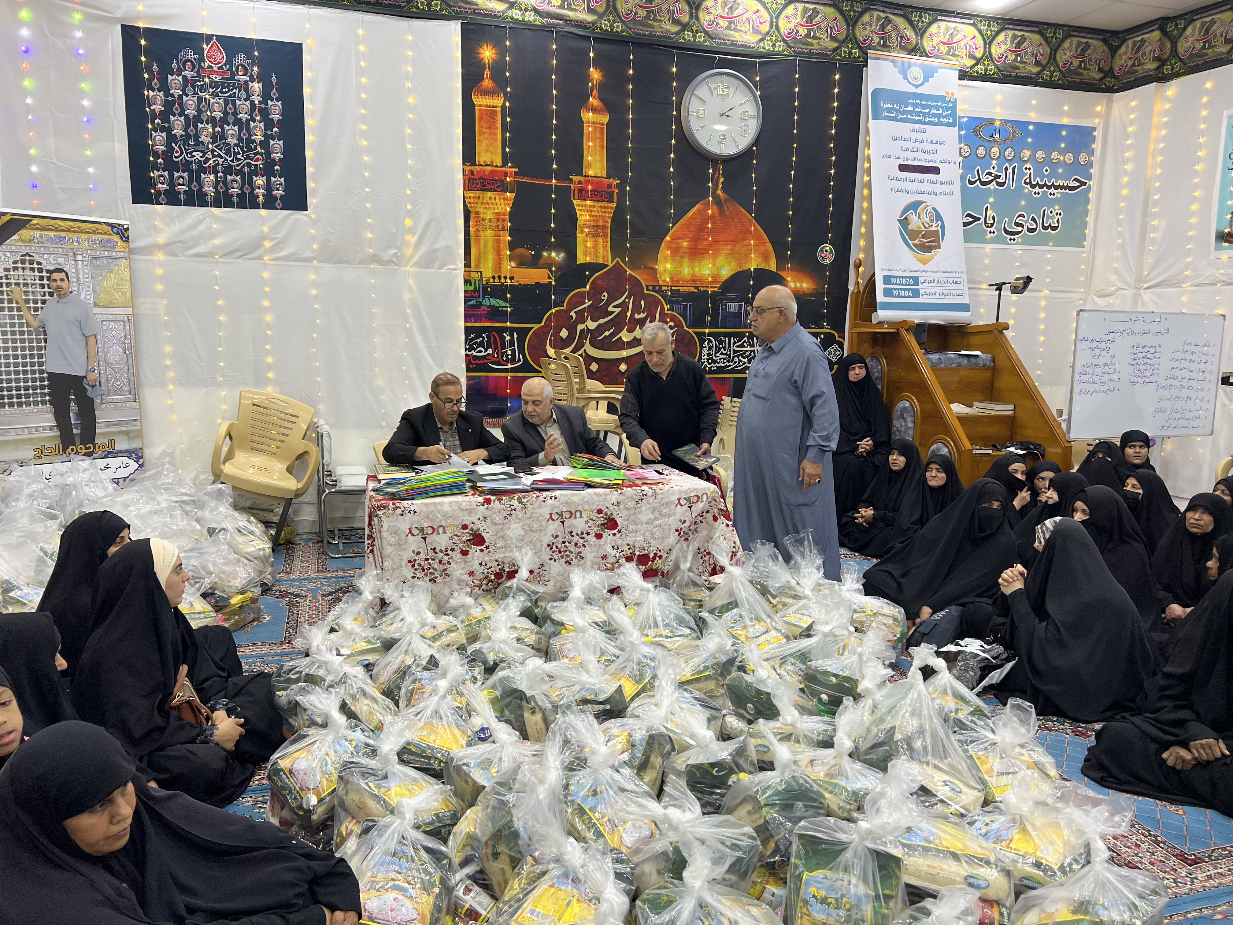 توزيع السلات الرمضانية على الأيتام والفقراء والمتعففين